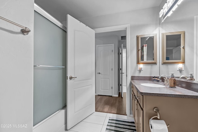 8035 S Talaco Trl, Tucson, AZ 85756 - full bathroom with vanity, tile patterned floors, and bathtub / shower combination