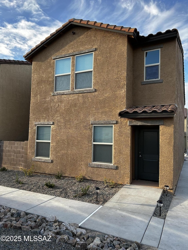 1126 E Descent St, Tucson, AZ 85719 - view of front of home with stucco siding and a tile roof