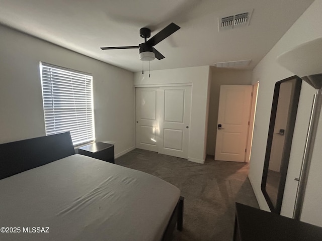 1126 E Descent St, Tucson, AZ 85719 - carpeted bedroom with a closet and ceiling fan