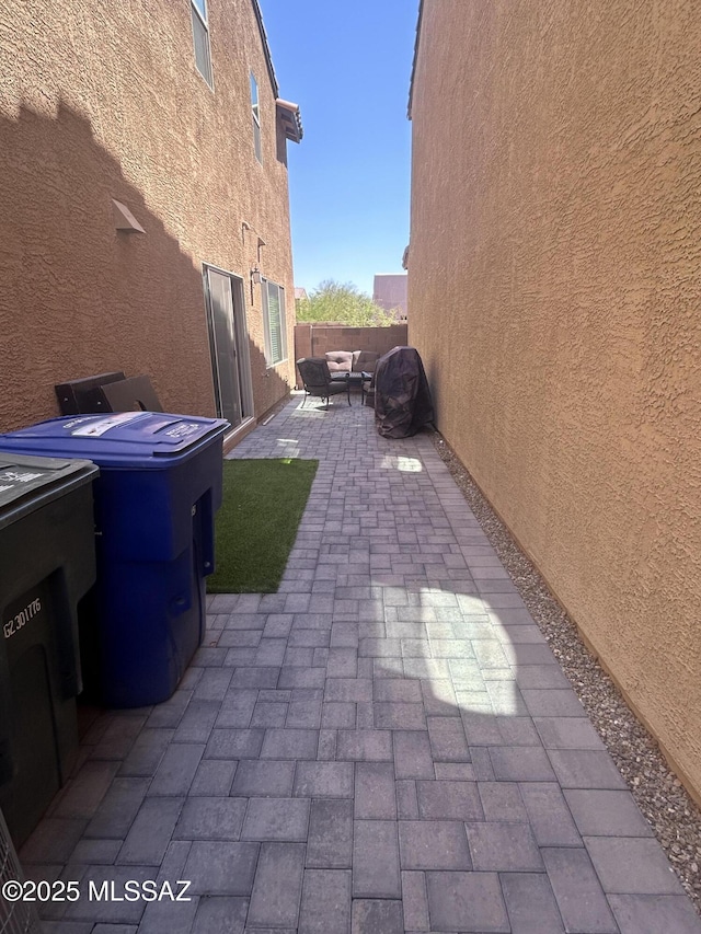 1126 E Descent St, Tucson, AZ 85719 - fenced backyard with a patio area