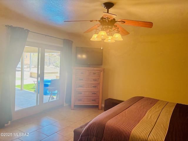 6100 N La Canada Dr, Tucson, AZ 85704 - bedroom with light tile patterned flooring, multiple windows, and ceiling fan