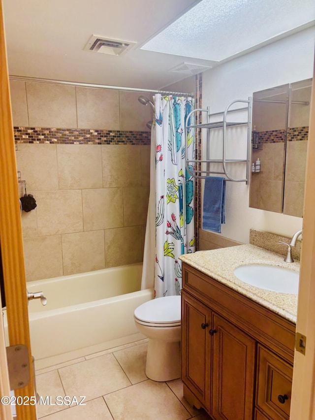 6100 N La Canada Dr, Tucson, AZ 85704 - full bath featuring tile patterned floors, vanity, and shower / tub combo with curtain