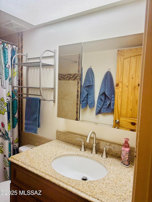 6100 N La Canada Dr, Tucson, AZ 85704 - full bath featuring vanity and curtained shower