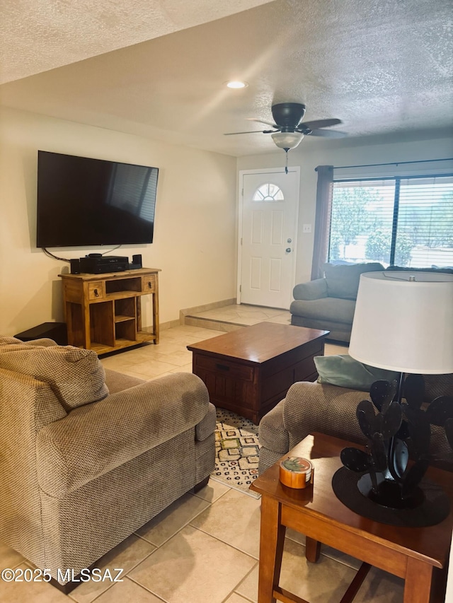 6100 N La Canada Dr, Tucson, AZ 85704 - living area with light tile patterned flooring, a textured ceiling, ceiling fan, and recessed lighting