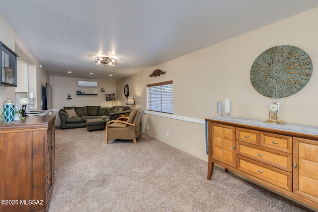 6951 E Hayne Pl, Tucson, AZ 85710 - living room with light colored carpet and a wall mounted air conditioner