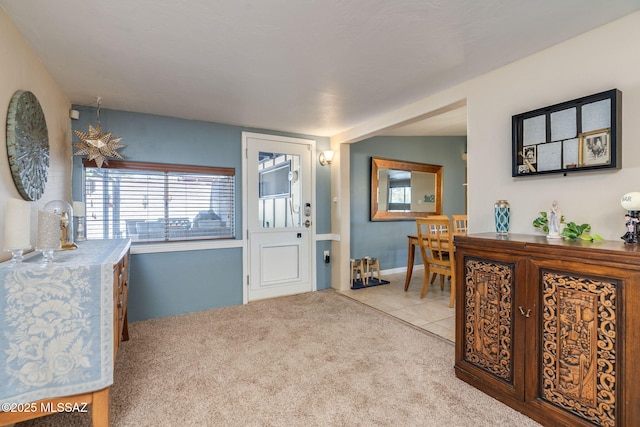 6951 E Hayne Pl, Tucson, AZ 85710 - carpeted foyer entrance featuring healthy amount of natural light