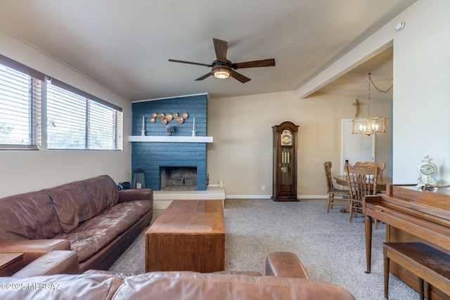 6951 E Hayne Pl, Tucson, AZ 85710 - living room with a ceiling fan, carpet flooring, a chandelier, and a fireplace