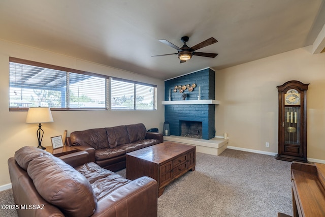 6951 E Hayne Pl, Tucson, AZ 85710 - living room featuring ceiling fan, carpet, a fireplace, and vaulted ceiling