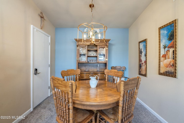 6951 E Hayne Pl, Tucson, AZ 85710 - dining area featuring carpet and a chandelier