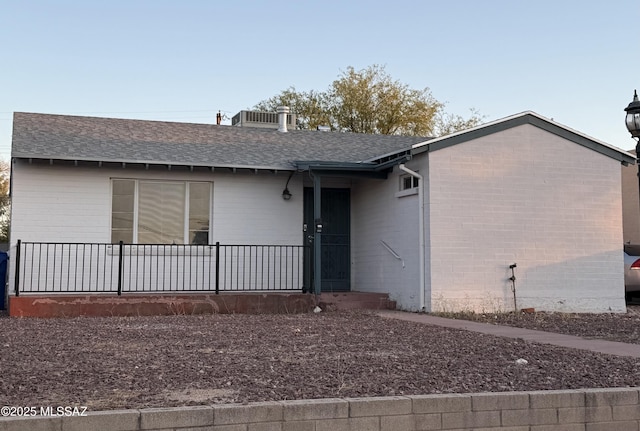 1412 E Silver St, Tucson, AZ 85719 - ranch-style house with roof with shingles and brick siding