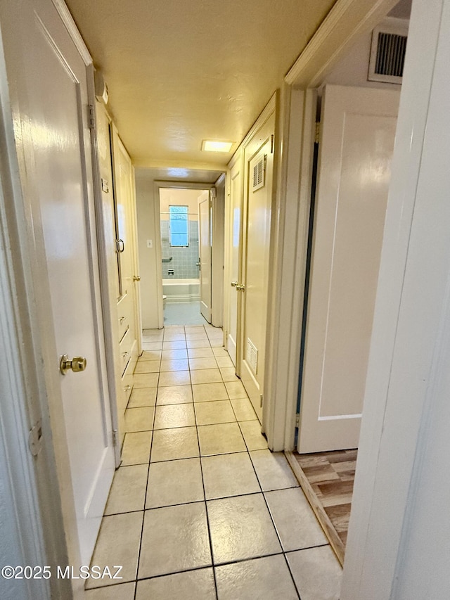 1412 E Silver St, Tucson, AZ 85719 - hall featuring light tile patterned flooring