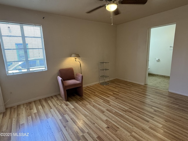 1412 E Silver St, Tucson, AZ 85719 - unfurnished room with light wood finished floors, ceiling fan, and healthy amount of natural light