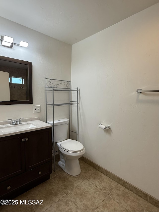 1412 E Silver St, Tucson, AZ 85719 - half bathroom featuring vanity and tile patterned floors