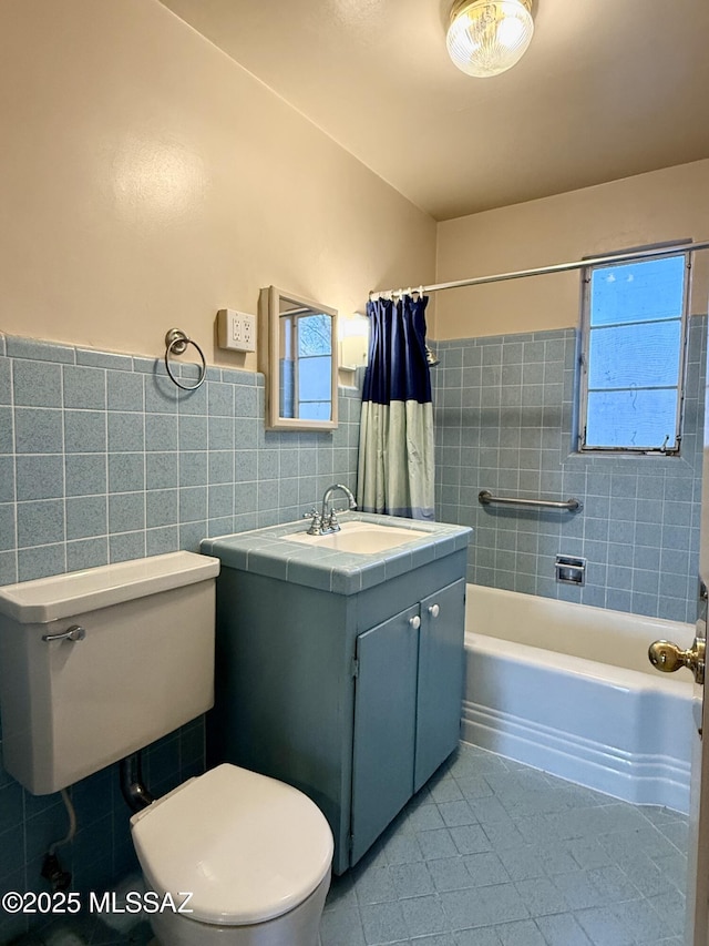 1412 E Silver St, Tucson, AZ 85719 - bathroom with tile walls, tile patterned flooring, vanity, shower / bath combination with curtain, and a wainscoted wall