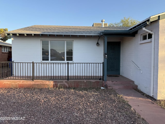 1412 E Silver St, Tucson, AZ 85719 - property entrance featuring a shingled roof