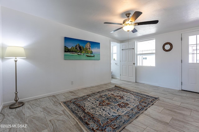 1435 E Grant Rd, Tucson, AZ 85719 - entrance foyer with ceiling fan and baseboards