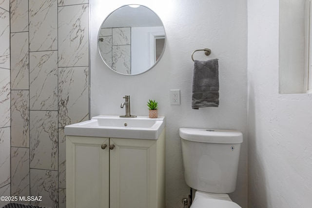 1435 E Grant Rd, Tucson, AZ 85719 - bathroom featuring vanity and toilet