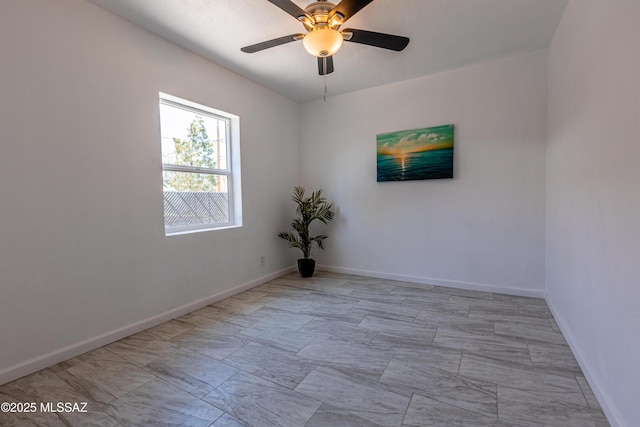 1435 E Grant Rd, Tucson, AZ 85719 - empty room featuring ceiling fan and marble look tile flooring