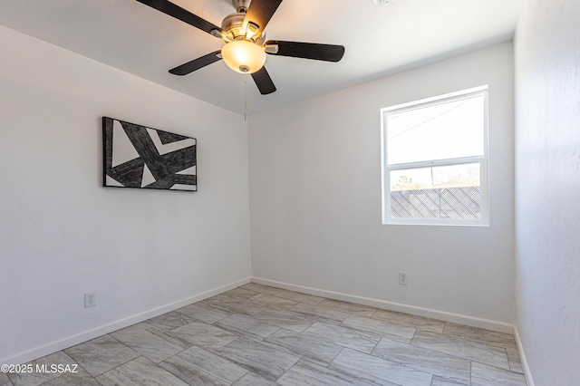 1435 E Grant Rd, Tucson, AZ 85719 - empty room featuring baseboards and ceiling fan