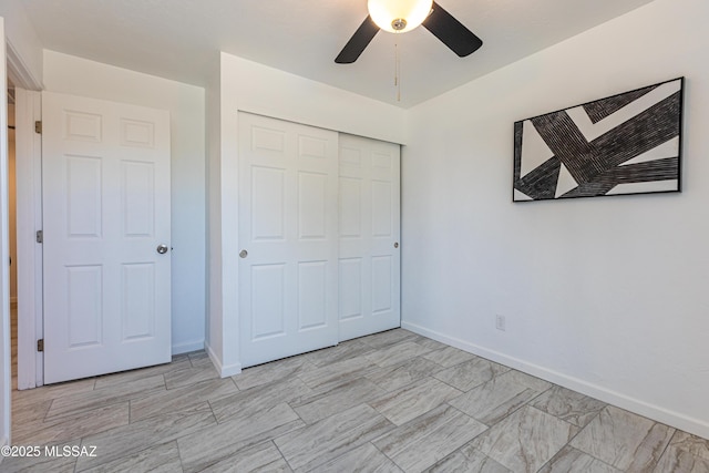 1435 E Grant Rd, Tucson, AZ 85719 - unfurnished bedroom with a closet and ceiling fan