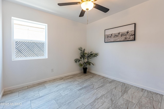 1435 E Grant Rd, Tucson, AZ 85719 - empty room featuring ceiling fan and baseboards
