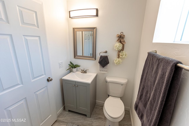 1435 E Grant Rd, Tucson, AZ 85719 - bathroom with vanity and marble finish floors