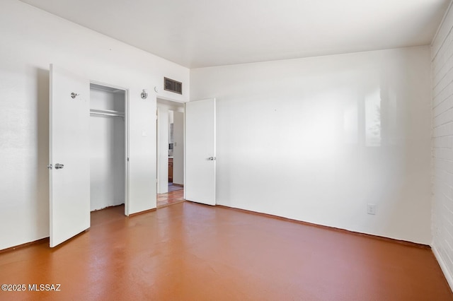 4009 N Fontana Ave, Tucson, AZ 85705 - unfurnished bedroom with concrete flooring and a closet