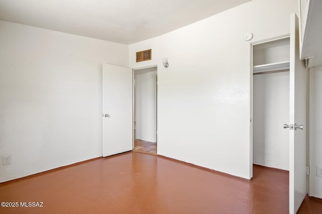 4009 N Fontana Ave, Tucson, AZ 85705 - unfurnished bedroom with a closet and concrete flooring