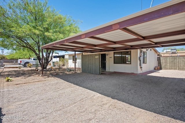 4009 N Fontana Ave, Tucson, AZ 85705 - back of house featuring gravel driveway