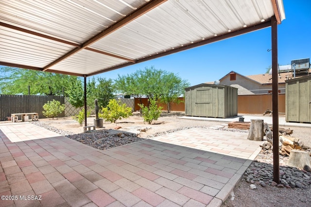 4009 N Fontana Ave, Tucson, AZ 85705 - fenced backyard with a shed and a patio area