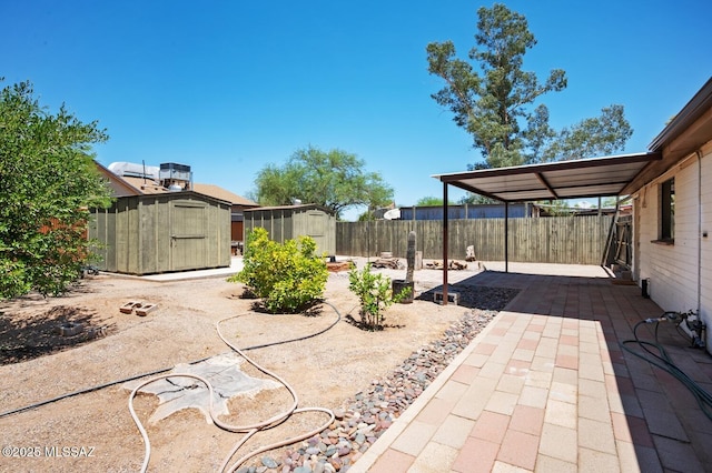 4009 N Fontana Ave, Tucson, AZ 85705 - fenced backyard featuring a storage unit and a patio area