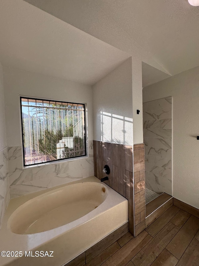 1129 W Amberbrooke Ave, Tucson, AZ 85745 - full bathroom with a bath, wood finished floors, and a wainscoted wall