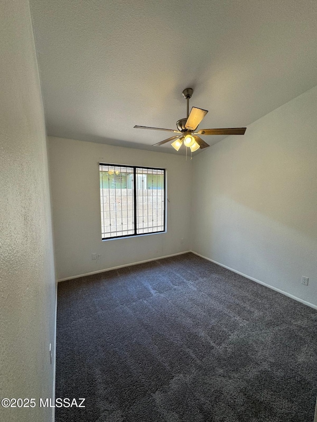 1129 W Amberbrooke Ave, Tucson, AZ 85745 - spare room with dark carpet and a ceiling fan