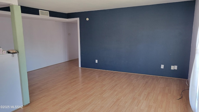 1967 N Camino Serna Unit D, Tucson, AZ 85715 - unfurnished room featuring wood finished floors