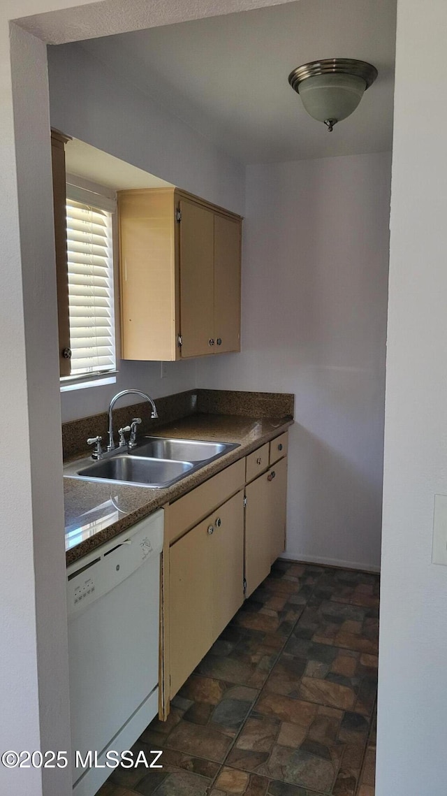 1967 N Camino Serna Unit D, Tucson, AZ 85715 - kitchen with dishwasher, dark countertops, cream cabinets, and stone finish flooring