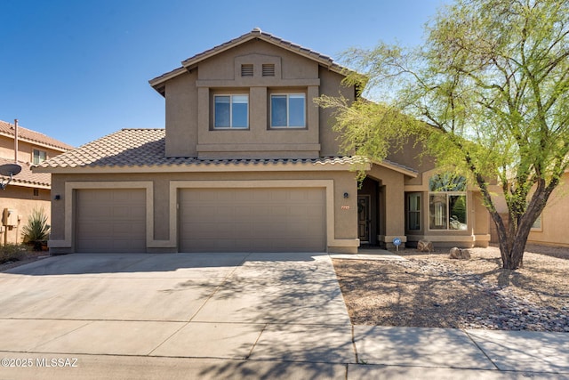 7705 W Taltson Dr, Tucson, AZ 85743 - view of front facade featuring driveway, stucco siding, a tiled roof, and an attached garage