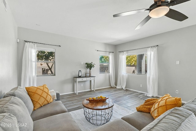 7705 W Taltson Dr, Tucson, AZ 85743 - living room with wood finished floors and ceiling fan