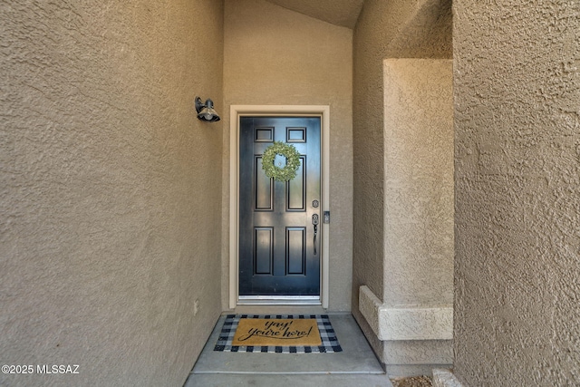 7705 W Taltson Dr, Tucson, AZ 85743 - property entrance featuring stucco siding