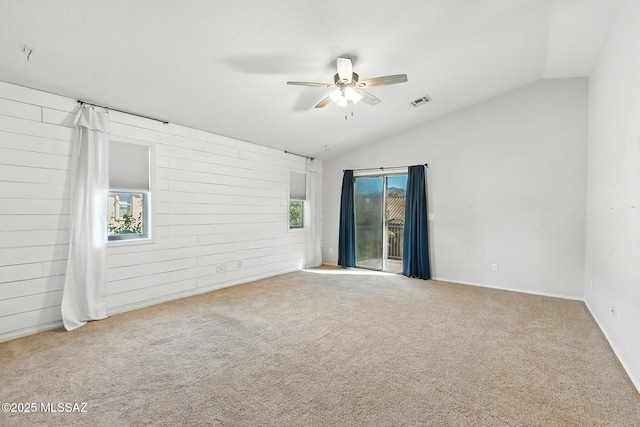7705 W Taltson Dr, Tucson, AZ 85743 - spare room with ceiling fan, vaulted ceiling, and carpet flooring