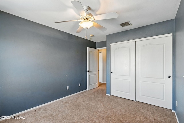 7705 W Taltson Dr, Tucson, AZ 85743 - unfurnished bedroom featuring carpet flooring, a closet, and ceiling fan