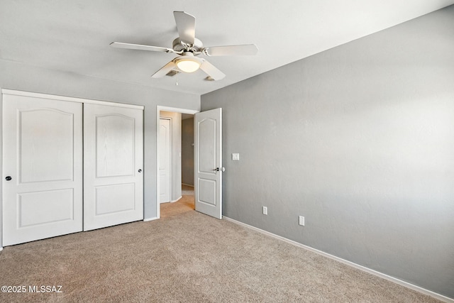 7705 W Taltson Dr, Tucson, AZ 85743 - unfurnished bedroom featuring carpet, a closet, and ceiling fan