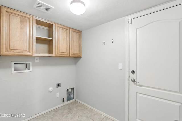 7705 W Taltson Dr, Tucson, AZ 85743 - washroom featuring hookup for a gas dryer, hookup for an electric dryer, hookup for a washing machine, cabinet space, and light tile patterned floors