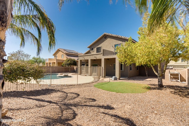 7705 W Taltson Dr, Tucson, AZ 85743 - view of swimming pool featuring a fenced backyard, a patio, and a ceiling fan