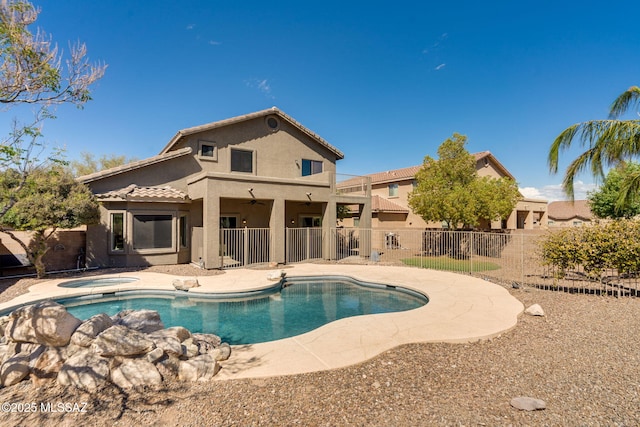 7705 W Taltson Dr, Tucson, AZ 85743 - view of swimming pool with an in-ground hot tub, a fenced backyard, a ceiling fan, and a patio area