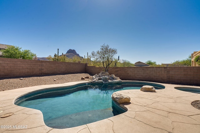 7705 W Taltson Dr, Tucson, AZ 85743 - view of swimming pool featuring a fenced backyard and a patio
