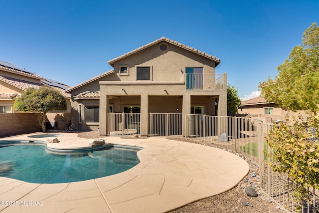 7705 W Taltson Dr, Tucson, AZ 85743 - view of pool featuring an in-ground hot tub, a patio, and a fenced backyard