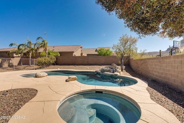 7705 W Taltson Dr, Tucson, AZ 85743 - view of swimming pool featuring a fenced backyard and an in-ground hot tub