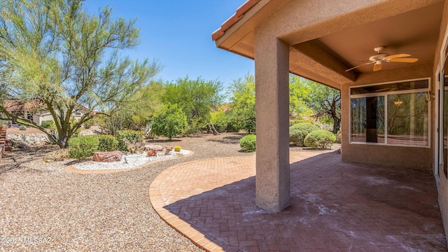 2315 E Chrysanthemum St, Oro Valley, AZ 85755 - view of yard featuring a ceiling fan and a patio area