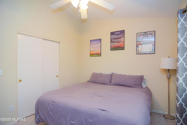 9495 N Winter Wren Ave, Tucson, AZ 85742 - carpeted bedroom with a closet, vaulted ceiling, and a ceiling fan