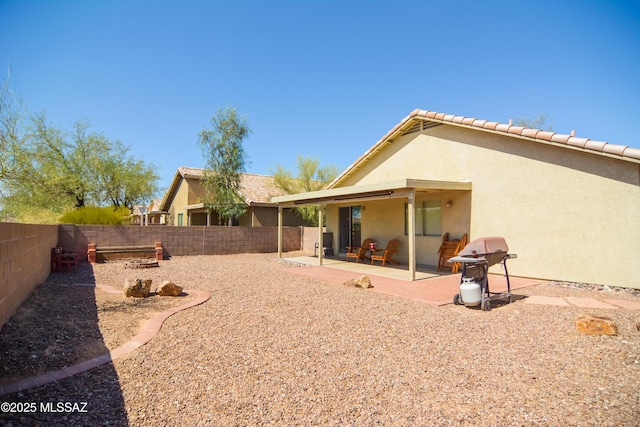 9495 N Winter Wren Ave, Tucson, AZ 85742 - fenced backyard featuring a patio